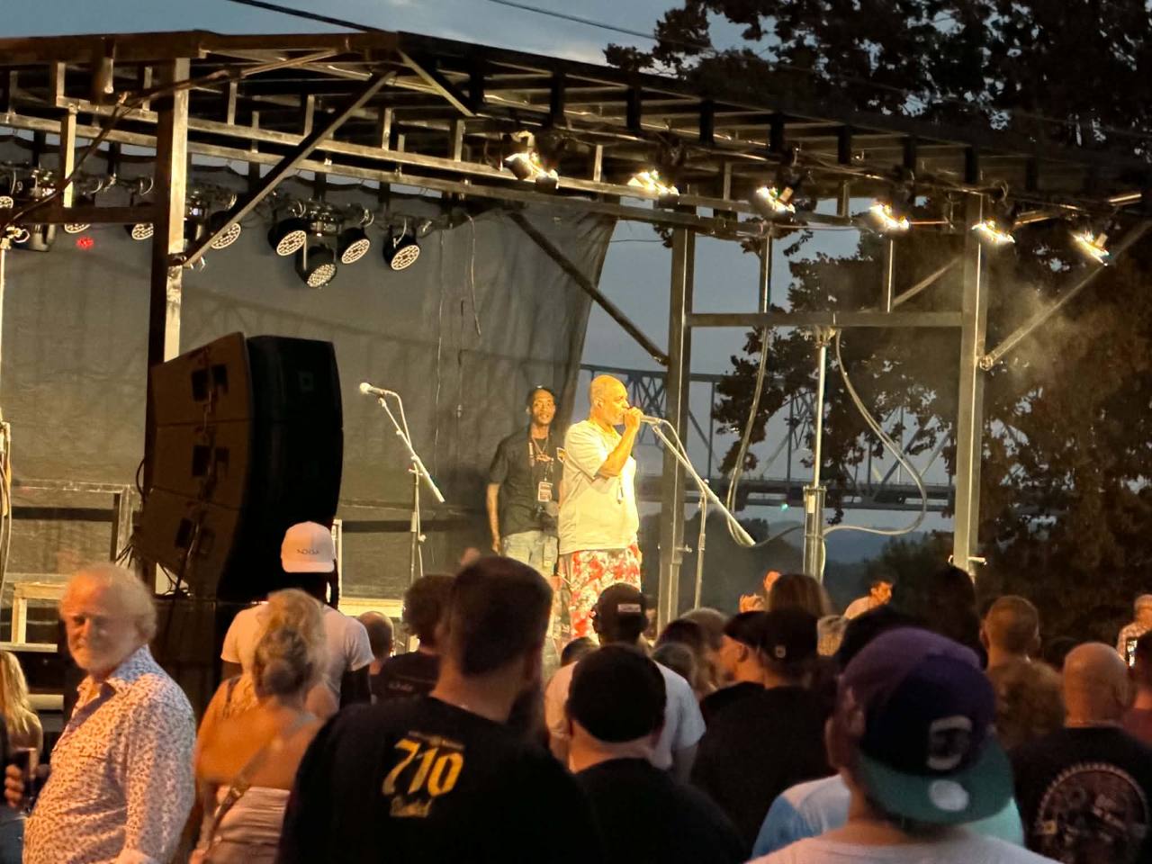 A live performer addressing an Ohio Cannabis Expo community event crowd in Portsmouth